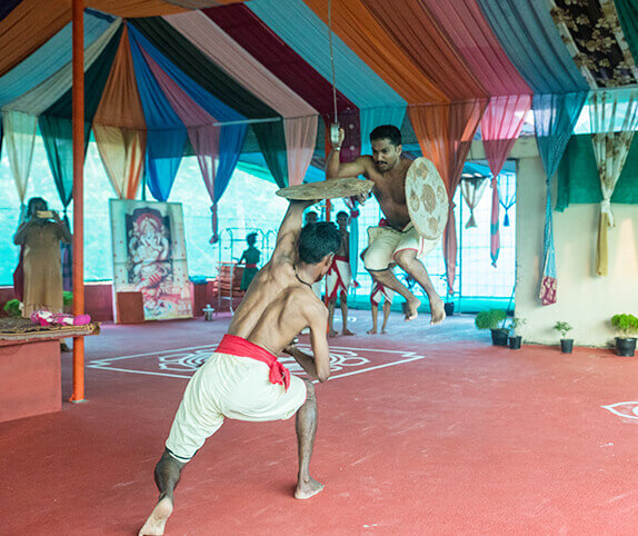 Two Man With Sheild And Sword Practicing Kalaripayattu